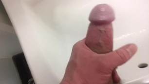 Stroking Big Cock in Public Restroom