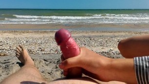 Public Handjob on the Beach Ends with Massive Cumshot