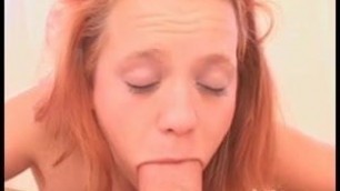 Little redhead tries taking cock down her throat