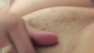 Using vibrator on her dry pussy lips