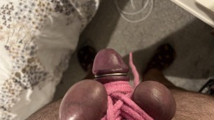 Cock and ball bound extremely tight with pink rope until they turn dark purple and go numb and cold