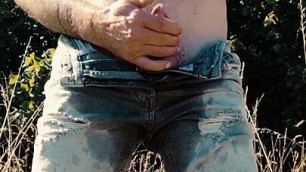 Scallyoscar piss drinking and soaking ripped denim shorts outdoor