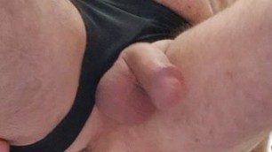 Master Ramon massages, jerks off and fingers himself horny, in sexy tight black shorts. Delicious